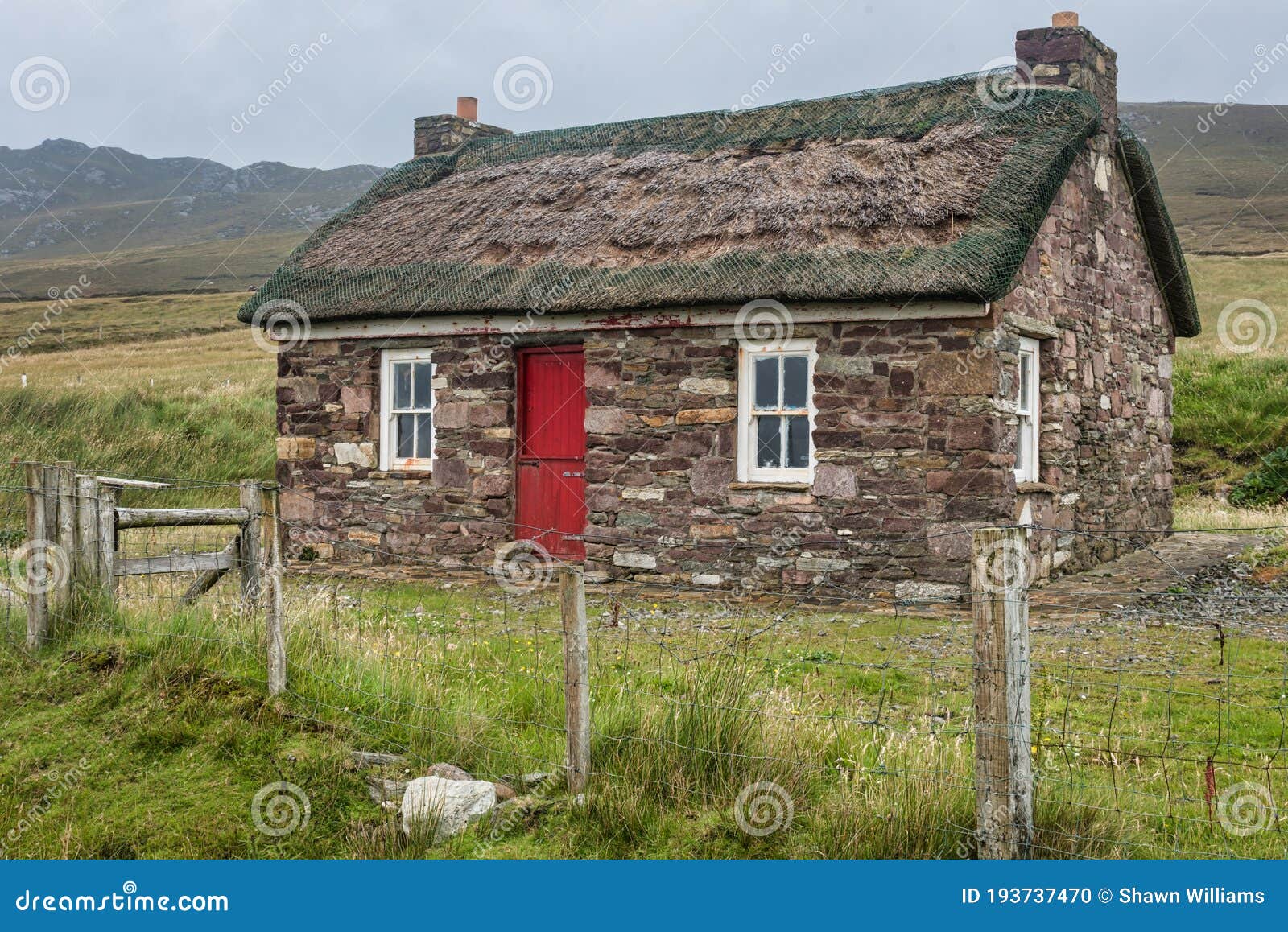 small-irish-cottage-achill-island-ireland-jul-traditional-thatched-193737470.jpg