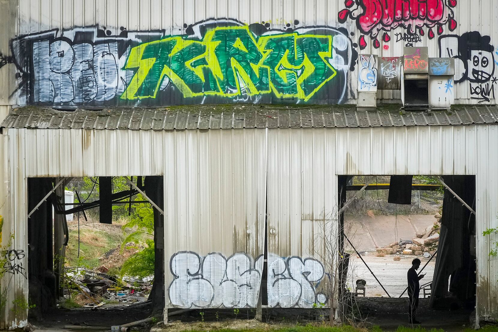 Graffiti covers a former plant at 240 Singleton in West Dallas on Tuesday, March 21, 2023.  Graffiti covers a former plant at 240 Singleton in West Dallas on Tuesday, March 21, 2023.